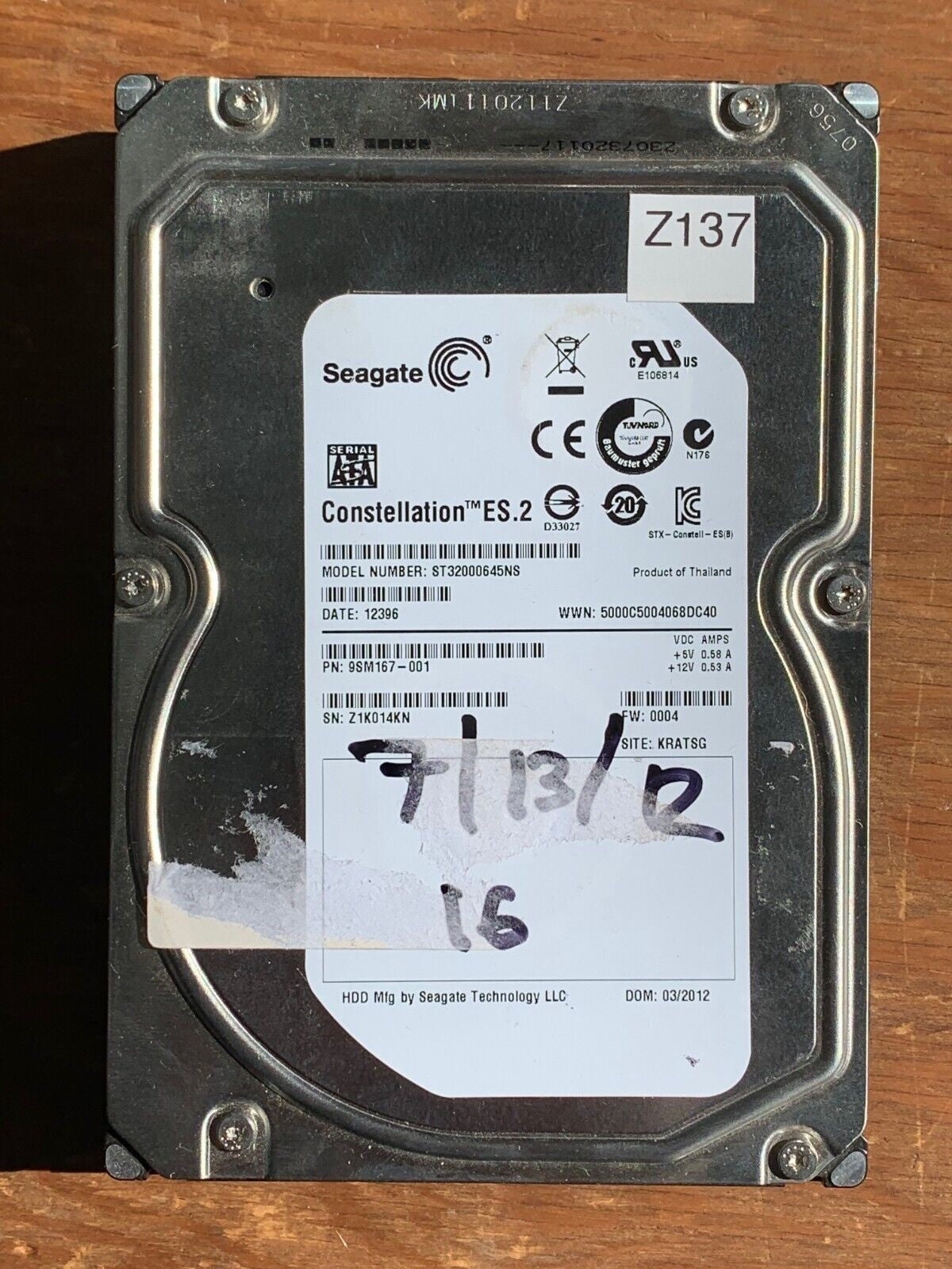 ST32000645NS – 100611023 Rev B – S/N: Z1K014KN – P/N: 9SM167-001 – F/W: 0004 – Site: KRATSG – Date: 12396 – 2TB – 3.5" – SATA