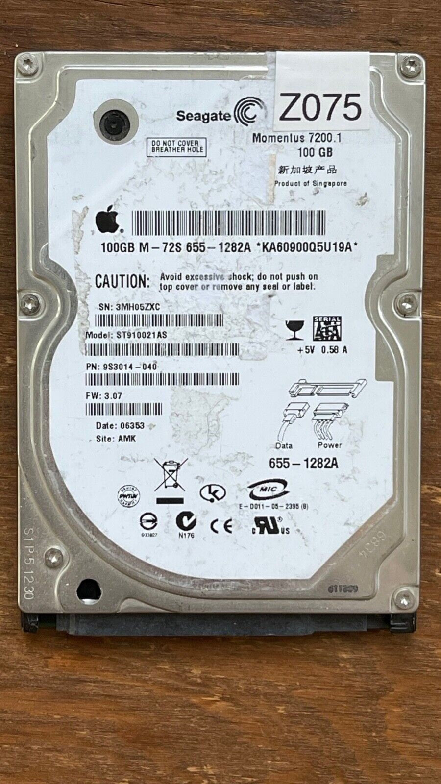 ST910021AS – 100349359 Rev B – S/N: 3MH05ZXC – P/N: 9S3014-040 – F/W: 3.07 – Site: AMK – Date: 06353 – 100GB – 2.5" – SATA