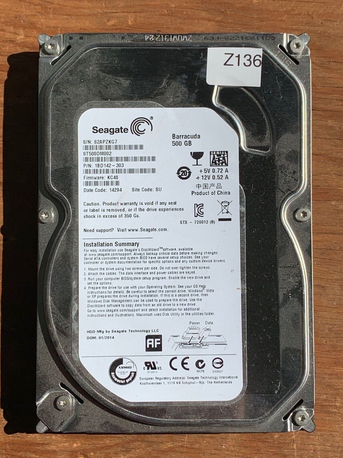 ST500DM002 – 100649872 REV B – S/N: S2APZKG7 – P/N: 1BD142-303 – F/W: KC48 – Site: SU – Date: 14294 – 500GB – 3.5" – SATA